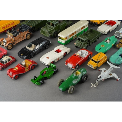 714 - A quantity of playworn assorted die cast vehicles, including Spot-On, Dinky, Corgi, Lledo, Macdonald... 