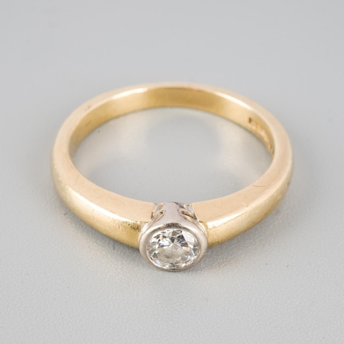 An 18ct gold diamond single stone ring. Set with a round brilliant cut ...