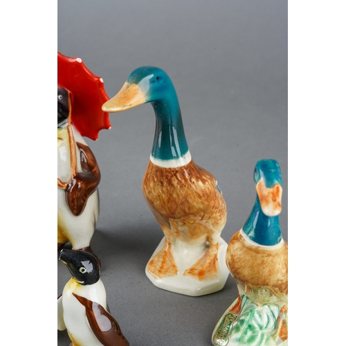 5 - A collection of Beswick birds to include a four piece penguin family and two ducks, tallest approxim... 