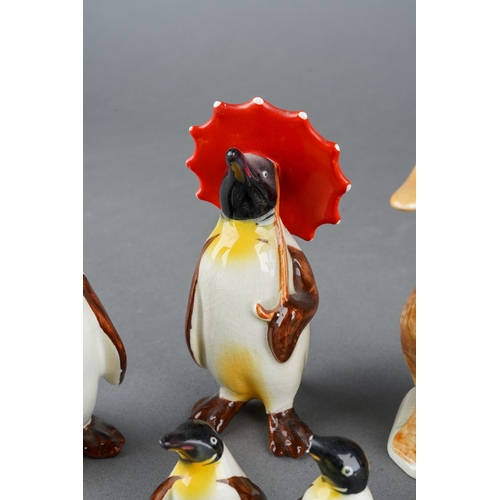 5 - A collection of Beswick birds to include a four piece penguin family and two ducks, tallest approxim... 