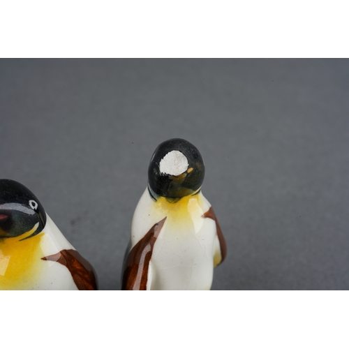 5 - A collection of Beswick birds to include a four piece penguin family and two ducks, tallest approxim... 