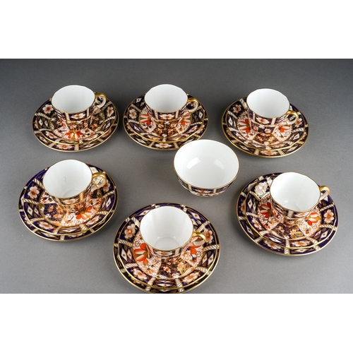 12 - A Royal Crown Derby Imari 2451 pattern nineteen piece tea set, comprising six trios and a sugar bowl... 