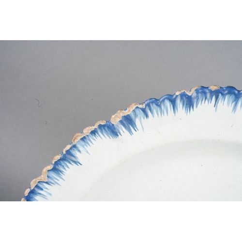 20 - An 18th Century Delft blue and white Peacock, underglaze marks to underside, approx 24cm diam togeth... 