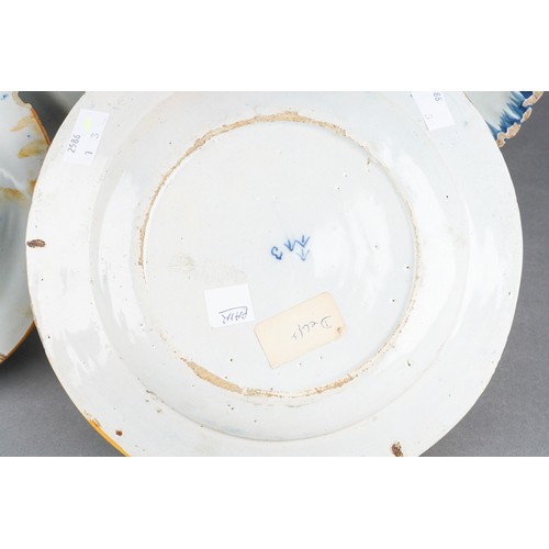 20 - An 18th Century Delft blue and white Peacock, underglaze marks to underside, approx 24cm diam togeth... 