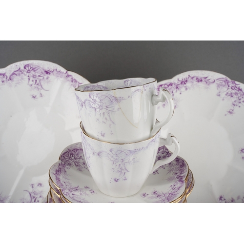 51 - A late 19th Century Foley China part tea set, manufactured by Wileman & Co, pattern no 5898, with sc... 