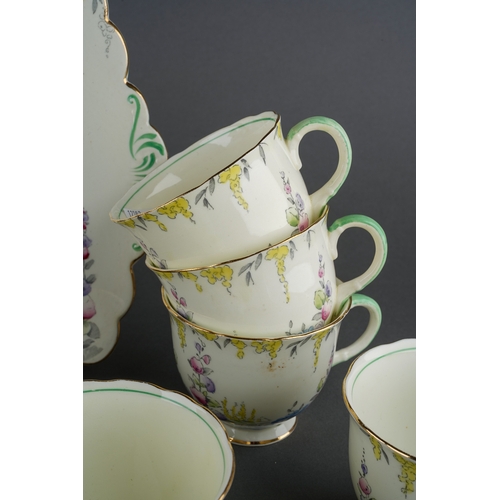 55 - A Foley China 1930s style six piece tea set decorated with flowers to include six cups, saucers, pla... 