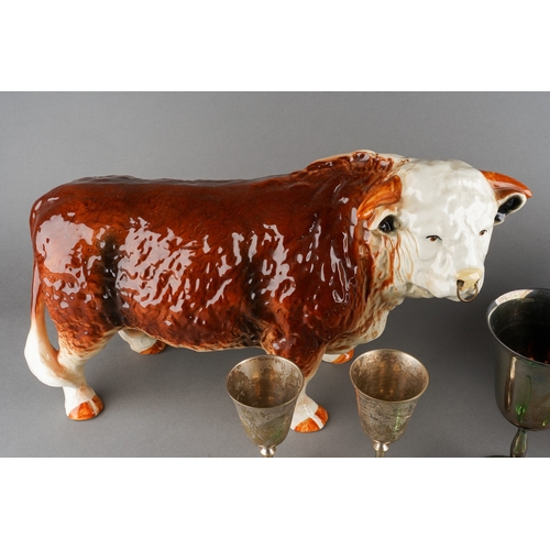 65 - Assorted lot to include a large Beswick style model of a Hereford Bull with brass nose ring, approx ... 