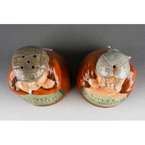 68 - A pair of Royal Doulton condiments including Toil for Men peppe and a Votes for Women salt, factory ... 