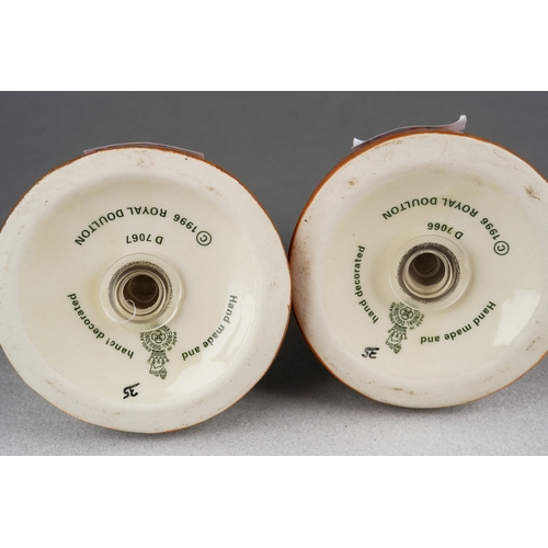 68 - A pair of Royal Doulton condiments including Toil for Men peppe and a Votes for Women salt, factory ... 