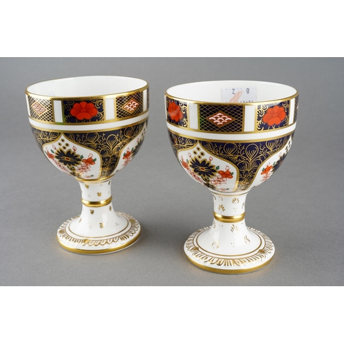 70 - A pair of Royal Crown Derby Imari 1128 goblets, red backstamps [2]