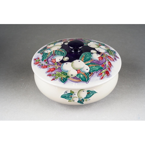 76 - A Moorcroft Snowberry dressing table jar and cover [222/4] designed by Nicola Slaney, 2003 date cyph... 