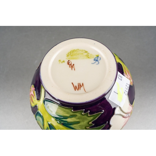77 - A Moorcroft Mallow [Herb Collection] vase, designed by Philip Gibson, released 1999, printed and pai... 