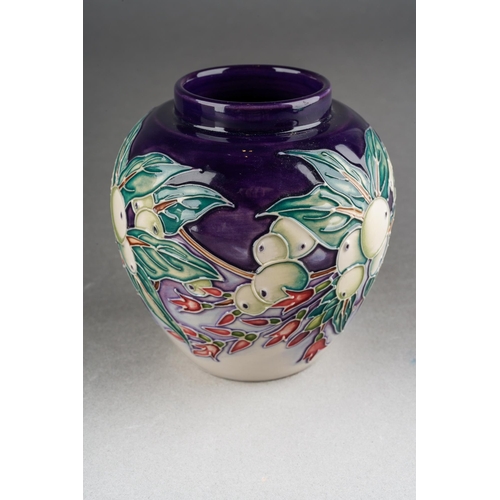 80 - A Moorcroft Snowberry squat vase [769/4], designed by Nicola Slaney, 2003 date cypher, printed and p... 