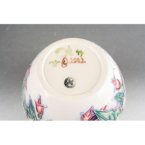 80 - A Moorcroft Snowberry squat vase [769/4], designed by Nicola Slaney, 2003 date cypher, printed and p... 