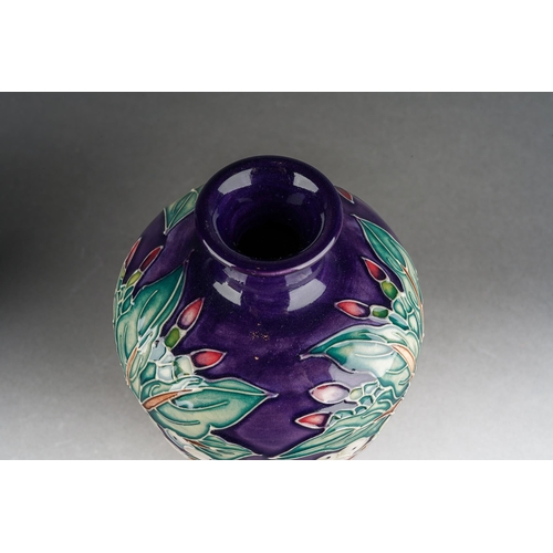 81 - A Moorcroft Snowberry [72/6] vase, designed by Nicola Slaney, 2003 date cypher, printed and painted ... 