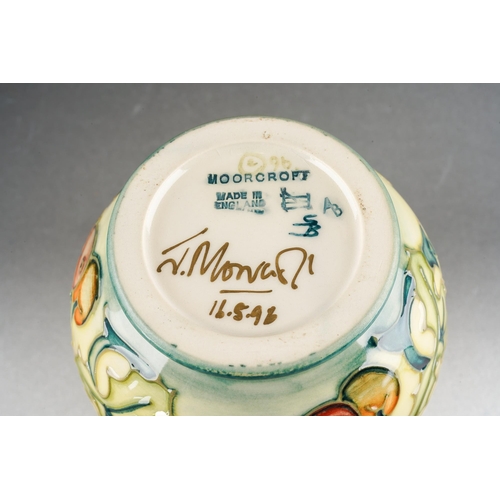 87 - A Moorcroft Bryony [Holly Berries] vase, designed by Rachel Bishop, 1996 date cypher, printed and pa... 