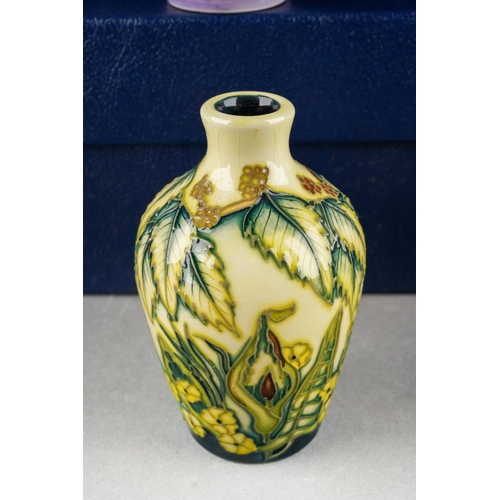 90 - A collection of four Moorcroft posy vases The Four Seasons 