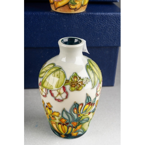 90 - A collection of four Moorcroft posy vases The Four Seasons 