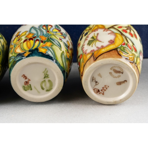 90 - A collection of four Moorcroft posy vases The Four Seasons 