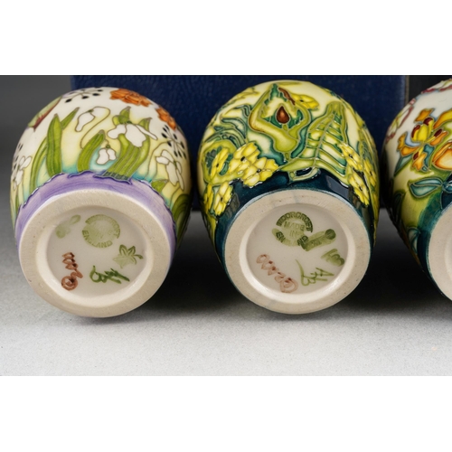 90 - A collection of four Moorcroft posy vases The Four Seasons 
