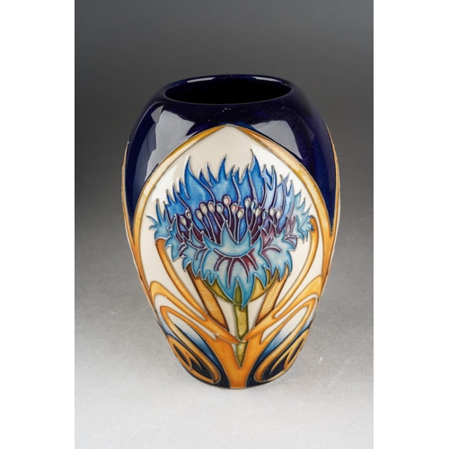 94 - A Moorcroft Cornflower Cavalcade vase, designed by Vicky Lovatt, limited edition 61/100, shape 102/5... 
