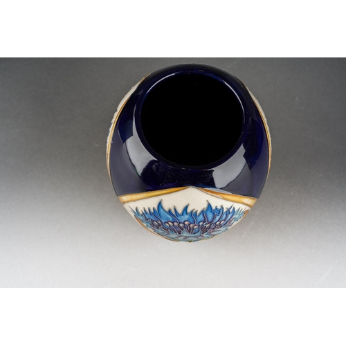 94 - A Moorcroft Cornflower Cavalcade vase, designed by Vicky Lovatt, limited edition 61/100, shape 102/5... 