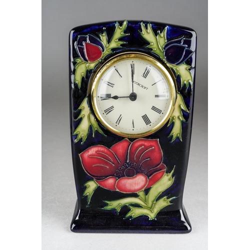 96 - A Moorcroft Anemone mantle clock, cobalt blue ground, 1999 date cypher, printed and painted marks, n... 