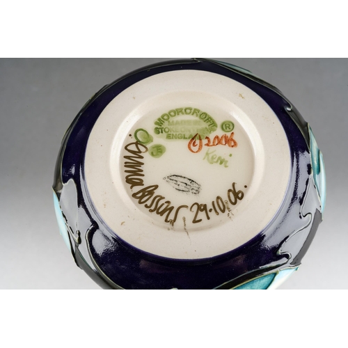 97 - A Moorcroft New Dawn onion shaped vase, designed by Emma Bossons, signed and dated 29.10.06, release... 