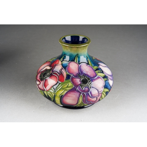 101 - A Moorcroft Anemone squat vase, 2003 date cypher, printed and painted marks, approx 11cm tall, boxed... 