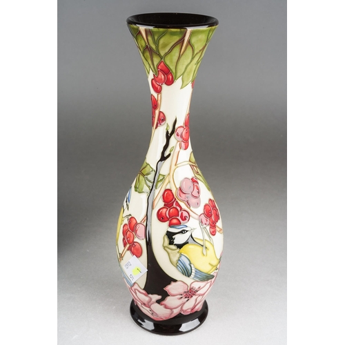 104 - A Moorcroft The Acrobats [Blue Tits] elongated vase, designed by Paul Hilditch, 2010 date code cyphe... 