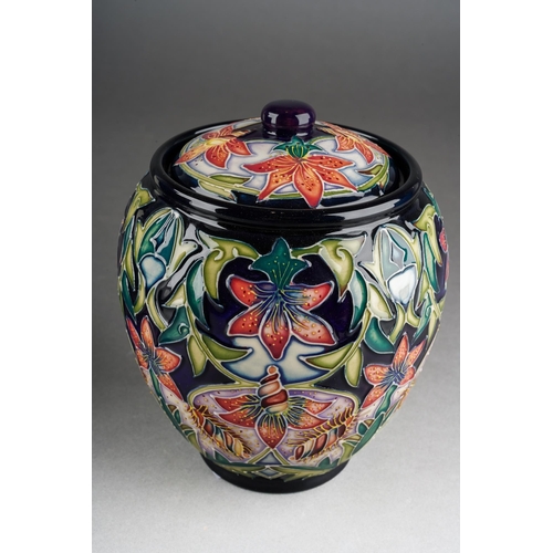 116 - A Moorcroft Scintilla jar and cover, released 2002, printed and painted marks, approx 15cm tall,