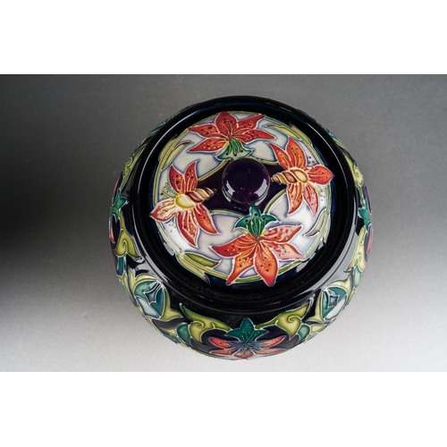 116 - A Moorcroft Scintilla jar and cover, released 2002, printed and painted marks, approx 15cm tall,