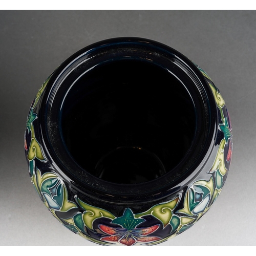116 - A Moorcroft Scintilla jar and cover, released 2002, printed and painted marks, approx 15cm tall,