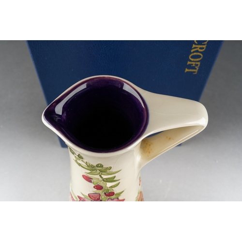 117 - A Moorcroft Amberwood elongated jug, designed by Rachel Bishop, 2002 date code, printed and painted ... 