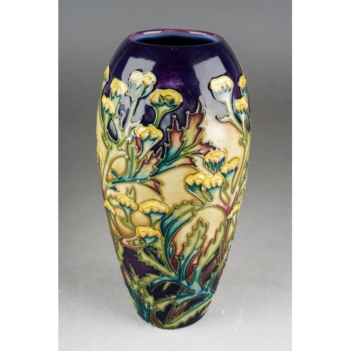 153 - A Moorcroft Tansy ovoid vase, painted marks, 2000 date cypher, approx 18.5cm tall, boxed [1]