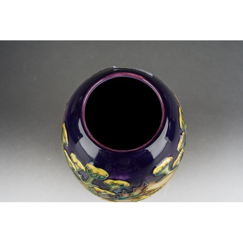 153 - A Moorcroft Tansy ovoid vase, painted marks, 2000 date cypher, approx 18.5cm tall, boxed [1]