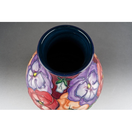 156 - A Moorcroft Pansy baluster vase designed by Rachel Bishop, released in 1993, impressed and painted m... 