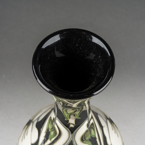167 - A Moorcroft Harlequinade vase, designed by Emma Bossons, dated 2003, approx 23.5cm tall, boxed [1]