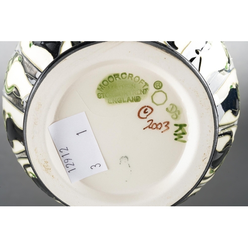 167 - A Moorcroft Harlequinade vase, designed by Emma Bossons, dated 2003, approx 23.5cm tall, boxed [1]