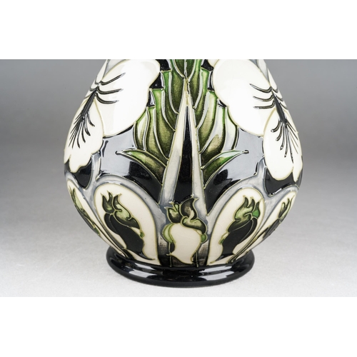 167 - A Moorcroft Harlequinade vase, designed by Emma Bossons, dated 2003, approx 23.5cm tall, boxed [1]