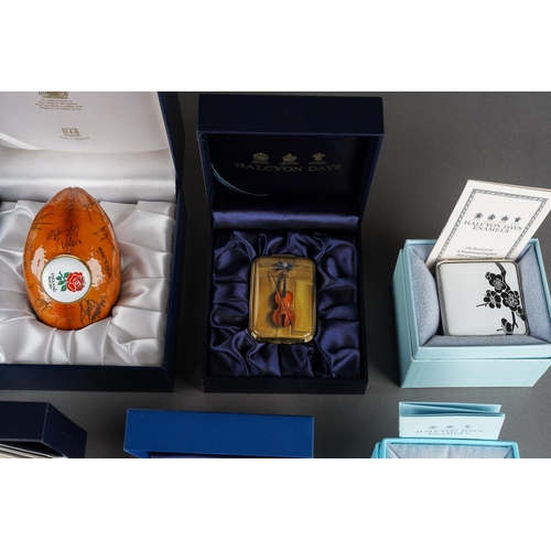 171 - A collection of ten boxed Halcyon Days enamel and porcelain boxes, including a limited edition 