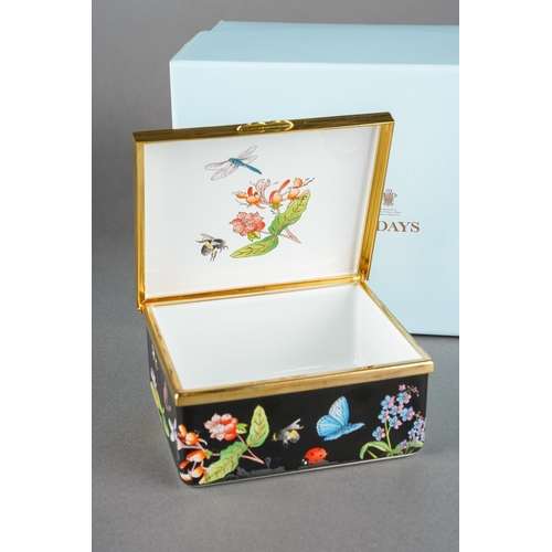 173 - A boxed Halcyon Days rectangular enamel trinket box, the black ground decorated with kingfisher, car... 