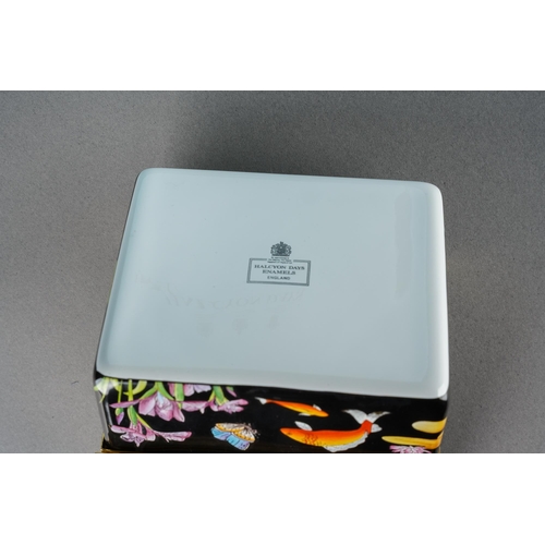 173 - A boxed Halcyon Days rectangular enamel trinket box, the black ground decorated with kingfisher, car... 