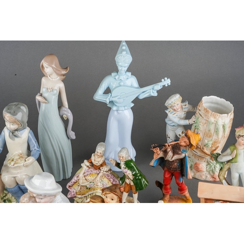 189 - A collection of twenty Continental and English porcelain figures including Lladro Ingenue, Serenade ... 