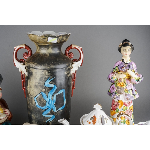 195 - A Staffordshire spill vase modelled with boy and girl with goat together with Royal Doulton Athos la... 