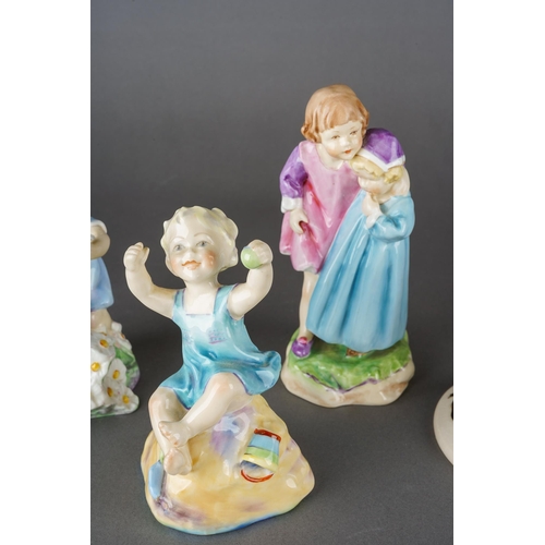 197 - Three Royal Worcester figures, comprising Babes in the Wood, model no.3302, a Freda Doughty 