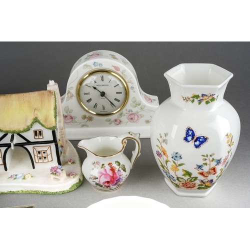 203 - A collection of ceramics to include The Coaching Inn by Coalport, Royal Doulton Flower Centrepiece, ... 