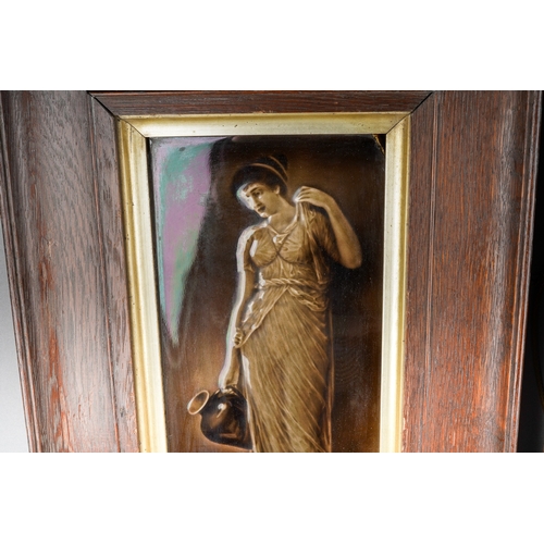 204 - A pair of late 19th century framed tiles of maidens, each frame measuring approximately 30cm by 46cm... 