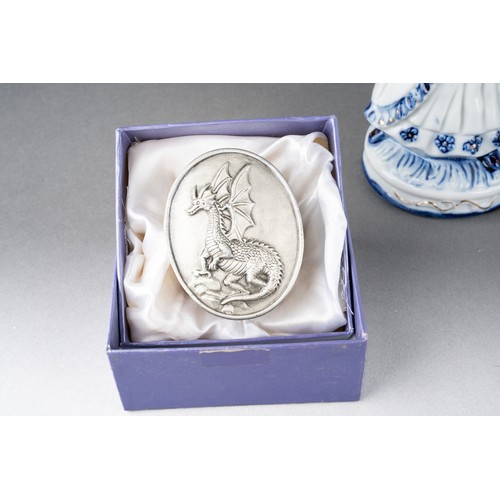 210 - A pair of continental 18th Century style blue and white figures, including boy and girl, the boy wit... 