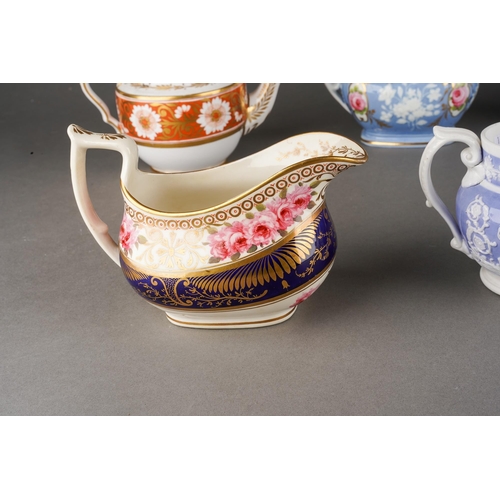 214 - A collection of 19th Century cream jugs to include: 
1. Coalport with central cobalt blue and gilt, ... 